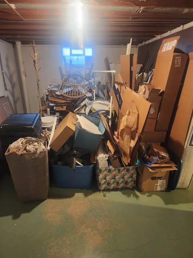 Roll-off dumpster container at job site for 4 Yard Dumpster Rental in Goulds